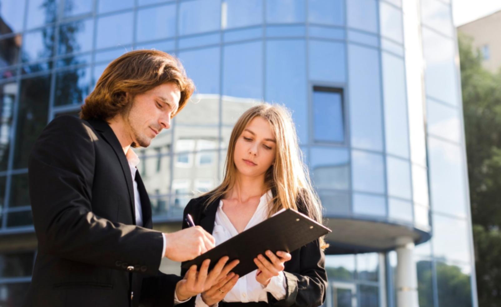 Financial professionals analyzing market data and forecasting models